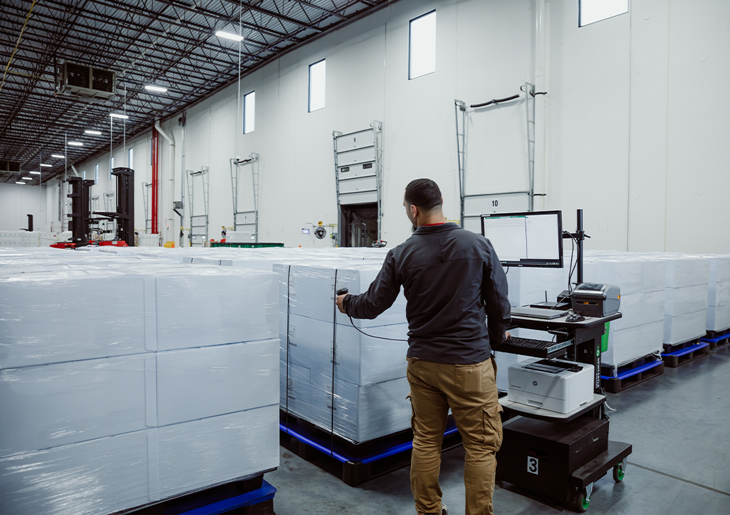 Worker Performing Inventory for MMI as Stockpile Solutions for Hospitals and Provider Networks